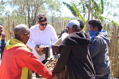 WithOneBean Co-founder Jake Mahar with farmers in Timor Leste