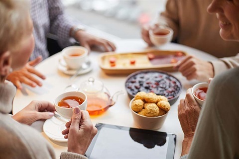 Drinking tea with sweets