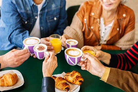 Group of senior people enjoying coffee