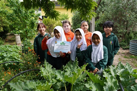 Clayton North Primary School students in the garden