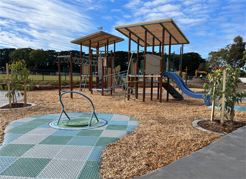 Mount Waverley Reserve playspace June 2024 - slides, inclusive spinner, play units