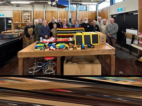 waverley woodworkers pose with collection of small wooden items