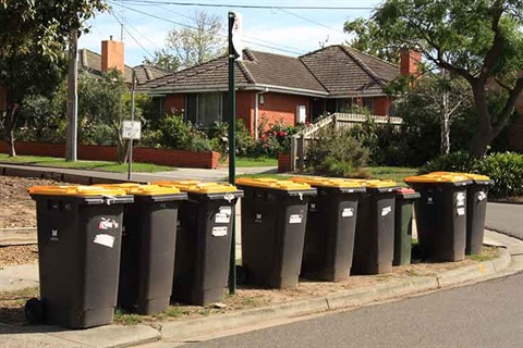 row of recycling bins