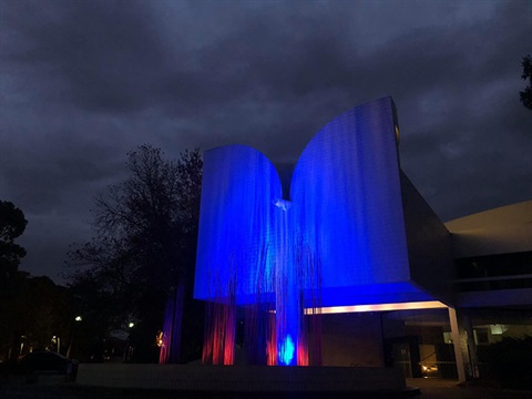 Monash Civic Centre lit up in blue